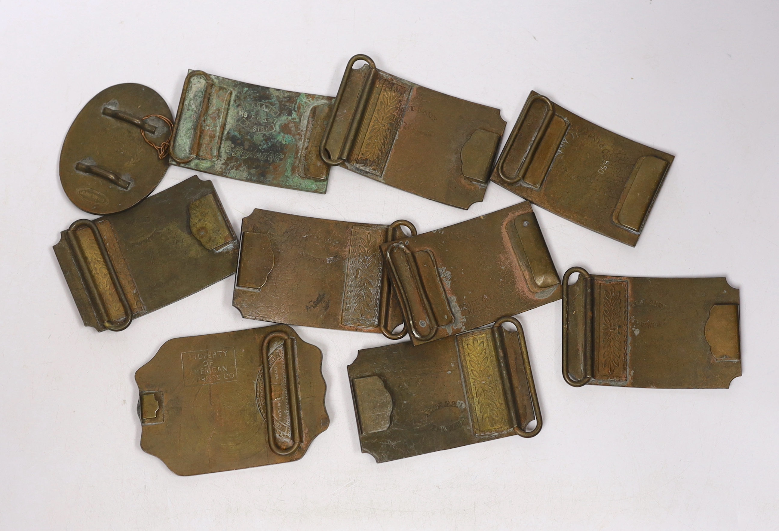A collection of Wells Fargo and similar belt buckles, mostly by Tiffany & Co.